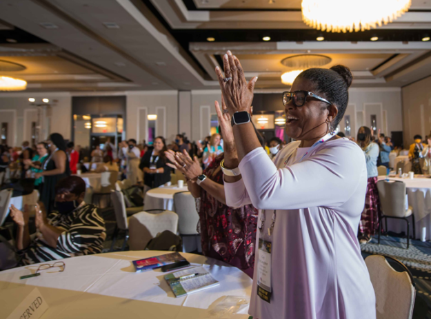 nominate woman cheering